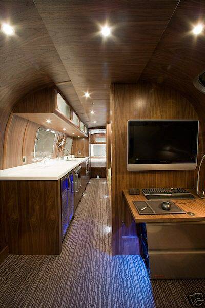 Airstream Renovations - I don't really know how they've managed to do it, but they've included 70's wood panelling in the renovation of this airstream but still managed to make it look modern and stylish.