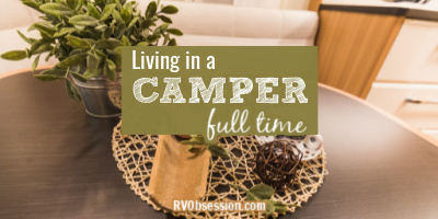 Table decor in an RV, with text overlay: Living in a camper full time.