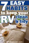 Bed inside an RV with a guitar and hat sitting on it. Text reads: 7 easy habits to keep your RV clean and tidy.
