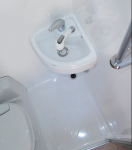 Small RV Trailers bathroom - I don't understand why they would bother putting in a vanity, if it's so small that you can't even get your hands under the tap?