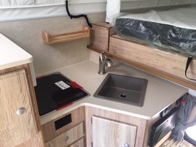 Kitchen in an Northstar 650SC Pop Up Truck Camper