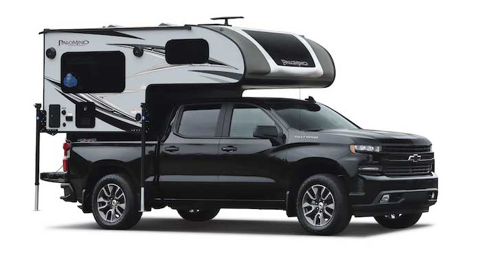 Palomino Backpack HS-750 truck camper on a black truck