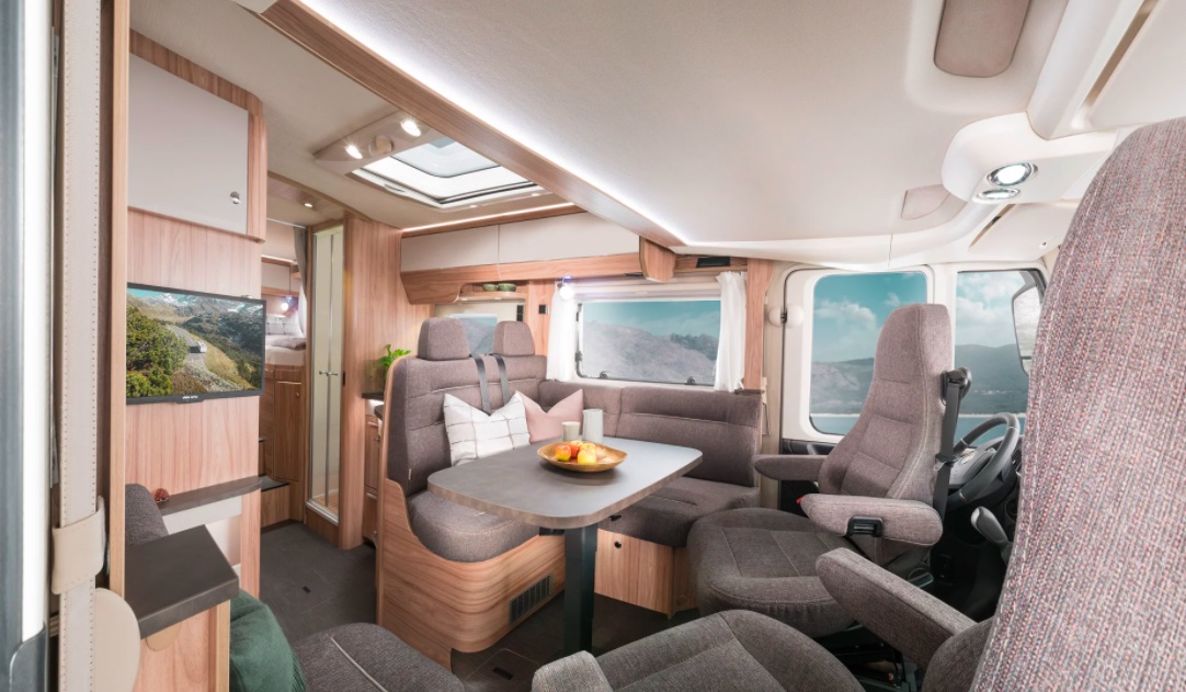 Internal layout of a Hymer motorhome showing the seating area.
