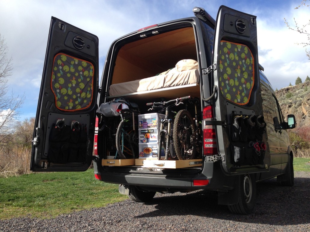 Sprinter Van Conversions - I love the idea of living so small and mobile, but with all the creature comforts of home. You can tell that this couple prioritises having fun when they're out on their adventures; with room for the toys inside their Sprinter van conversion.