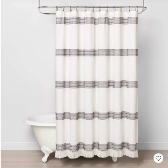 White shower curtain with grey horizontal stripes.