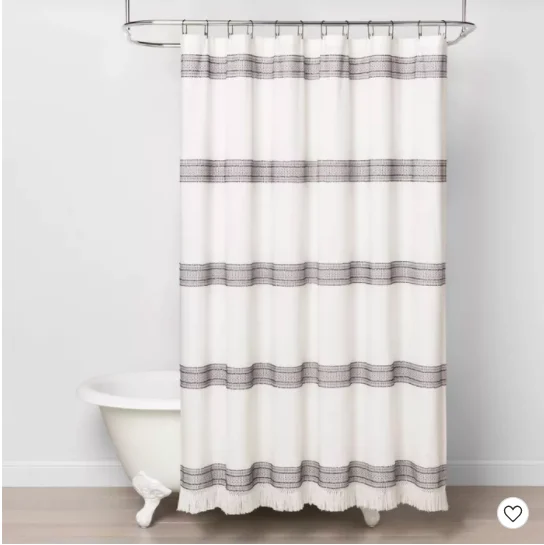 White shower curtain with grey horizontal stripes.